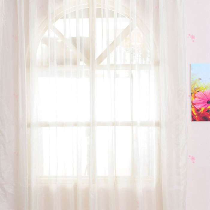 What are the benefits of gauze curtains softening natural light?