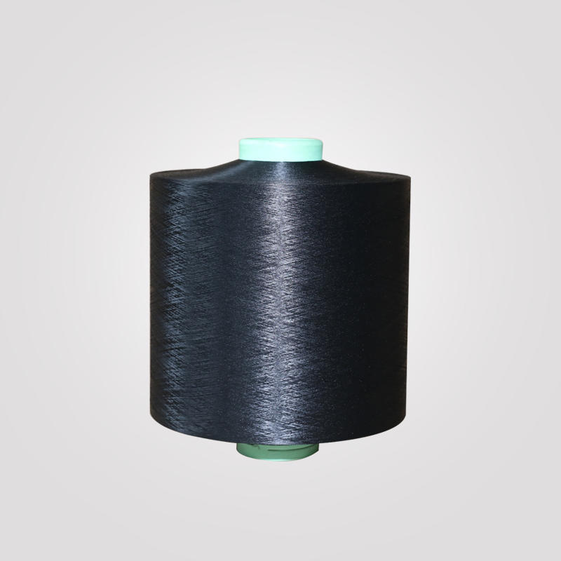 Why does polyester black silk yarn have a drapey feel?