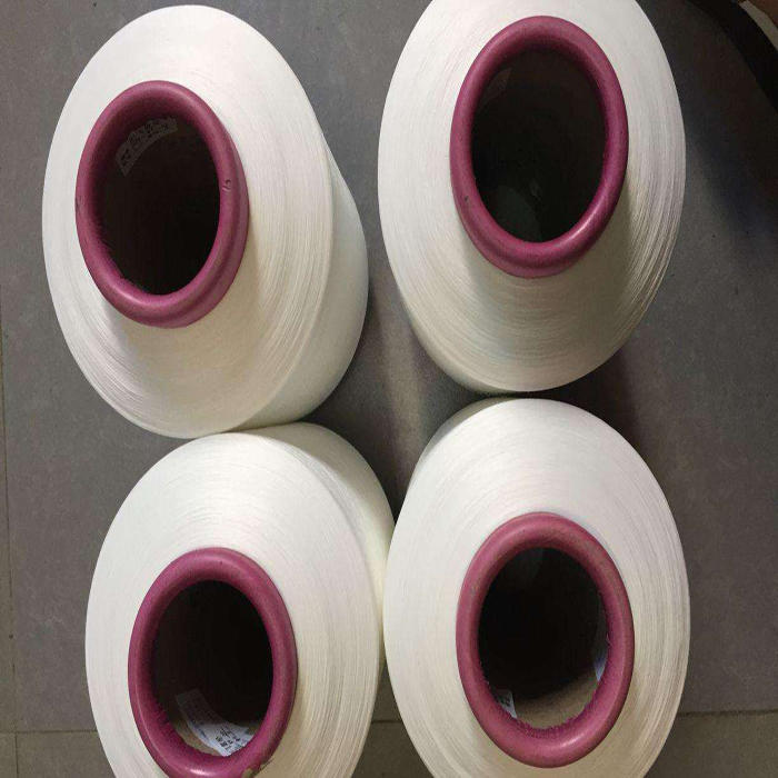 What are the characteristics and applications of Covered Silk Yarn?